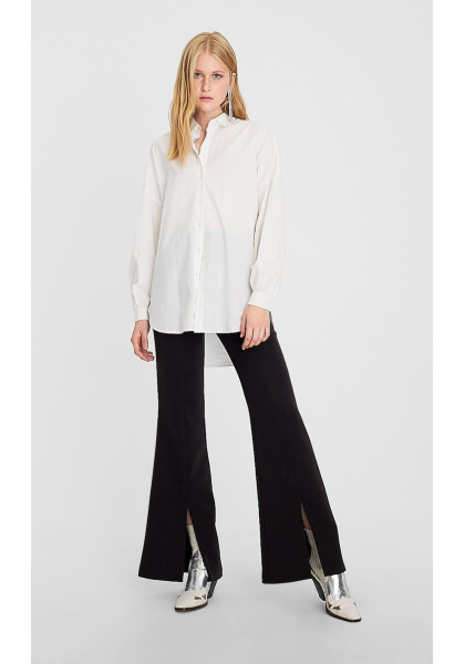 Flared trousers with opening Stradivarius